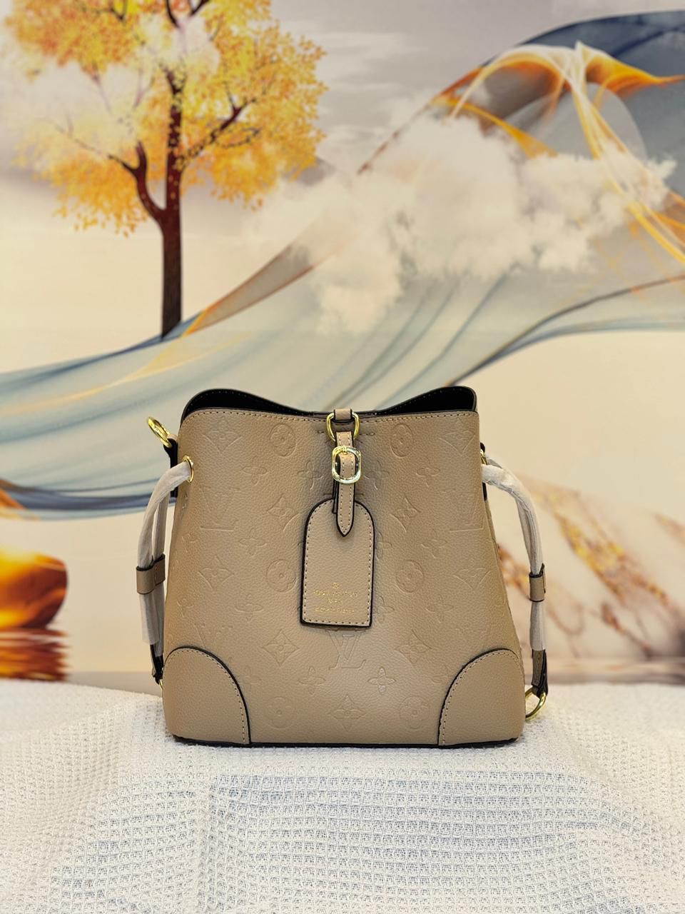 Louis Vuitton NéoNoé BB (Tourterelle Monogram Empreinte Leather)