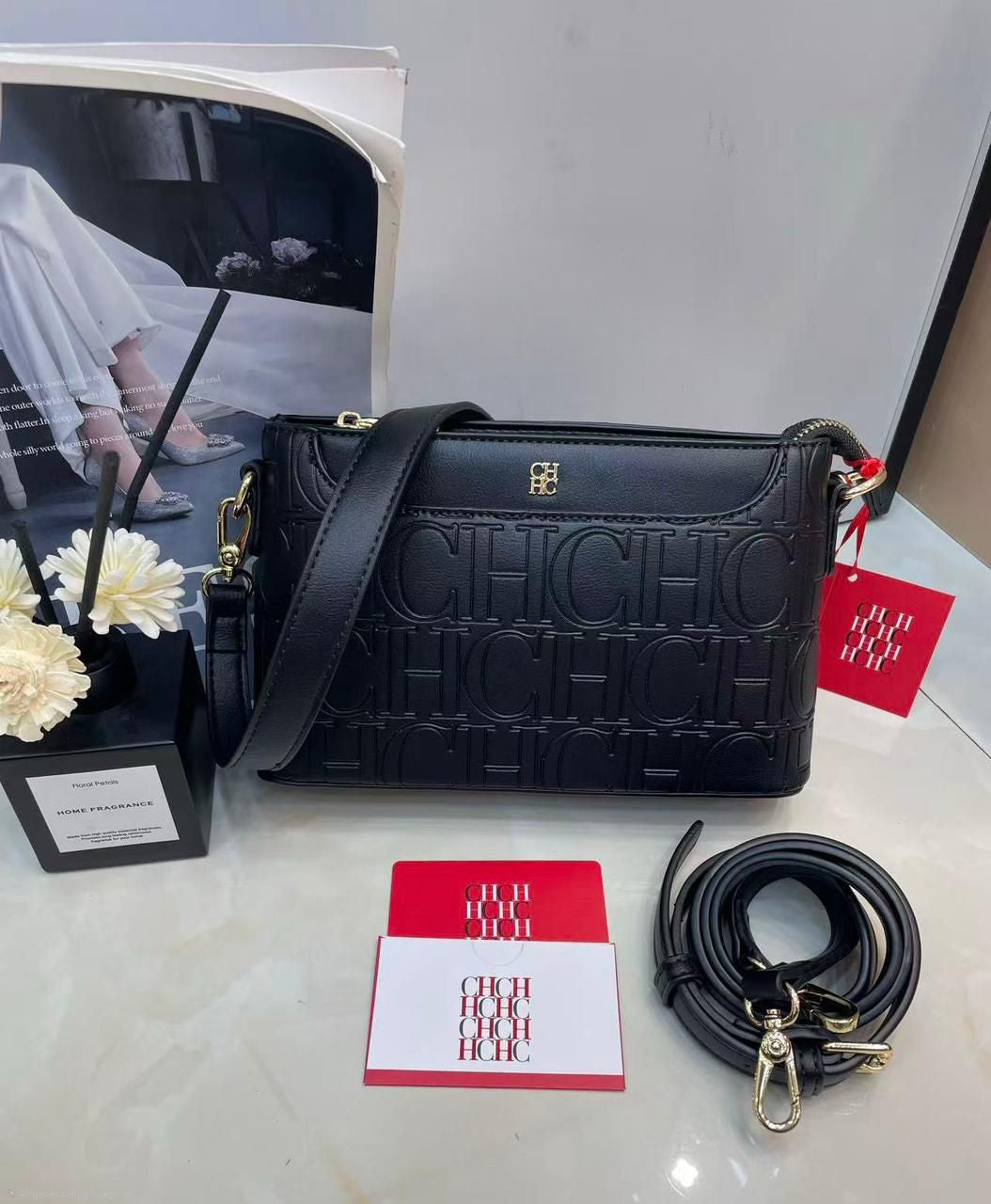 Carolina Herrera (CH) Monogram Embossed Crossbody Bag – Black