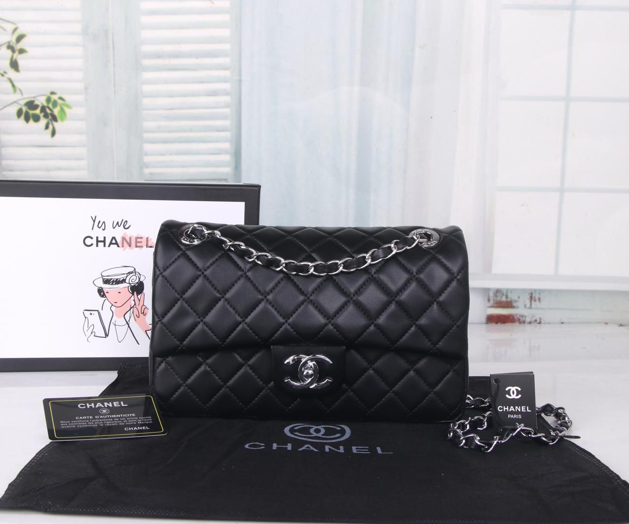 Chanel Classic Double Flap Bag (Black Lambskin with Silver Hardware)
