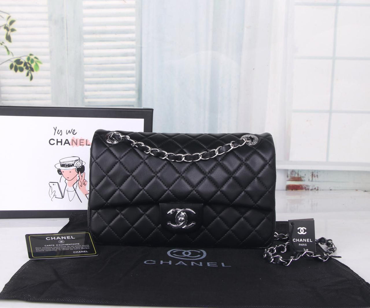 Chanel Classic Double Flap Bag (Black Lambskin with Silver Hardware)