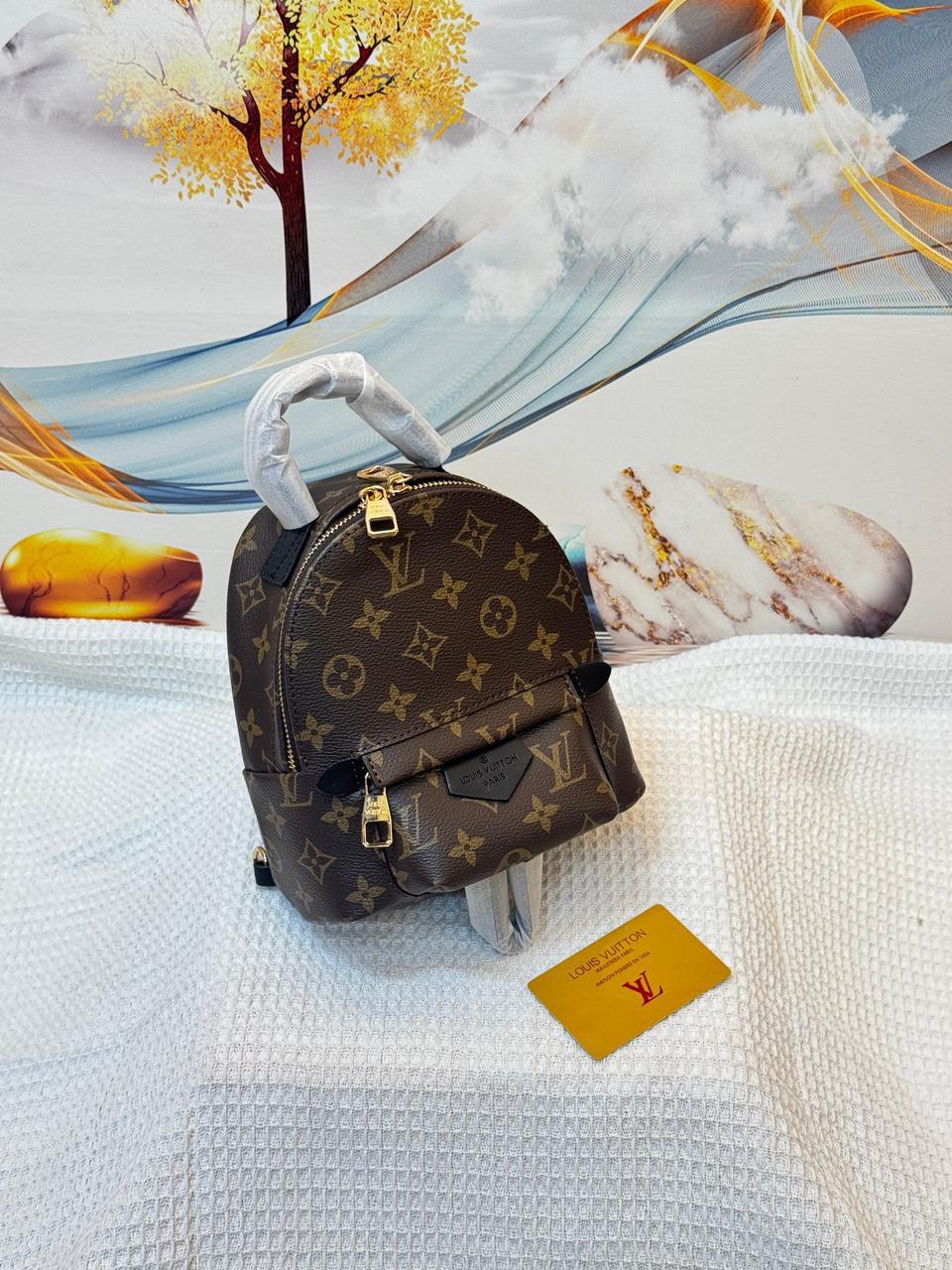Louis Vuitton Palm Springs Mini in Monogram Reverse Canvas (Brown)