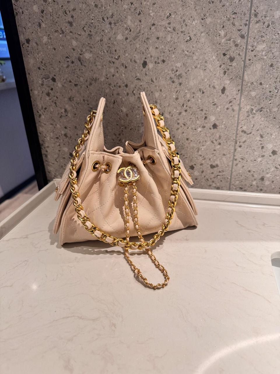 Chanel Small Shopping Bag (Kelly Style Drawstring) in Grained Calfskin (Beige)