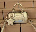 Coach Micro Rowan Satchel With Horse And Carriage (Pale Gold)