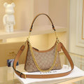 Coach Mira Shoulder Bag in Signature Canvas (Tan/Rust)