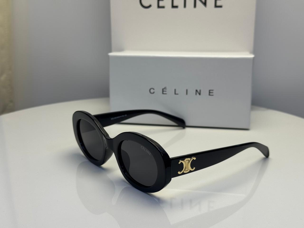 Celine Triomphe Oval Sunglasses in Black