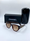 Chanel Zipper Detail Cat-Eye Sunglasses in Burgundy