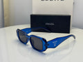 Prada Symbole Rectangular Sunglasses in Transparent Blue