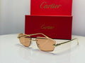 Cartier Panthère de Cartier Rimless Sunglasses (Gold/Peach Tint)