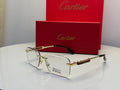 Cartier Première de Cartier Rimless Blue Light Blocking Eyewear (Gold/Clear)