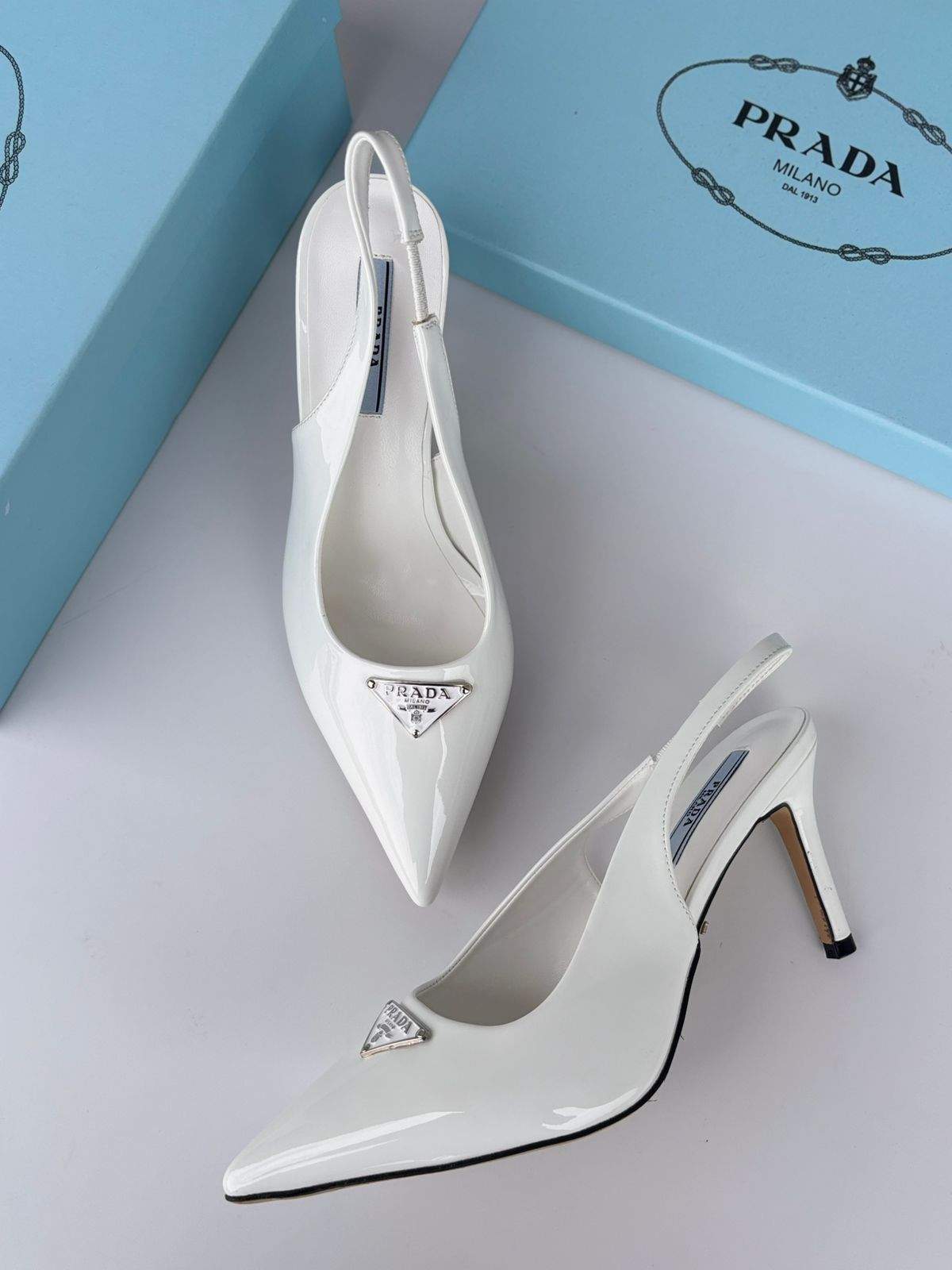 Prada Brushed Leather Slingback Pumps (White)