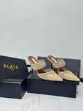 Alaïa Mesh and Patent Leather Mules (Beige)