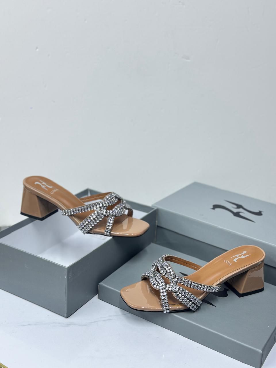 GINA Swarovski Crystal Knotted Block Mules (Beige/Nude)
