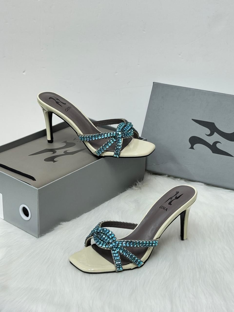 GINA Swarovski Crystal Knotted Mules (Cream/Aquamarine)