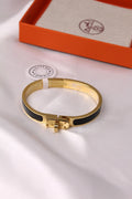 Hermès Kelly Enamel Bracelet (Gold and Black)