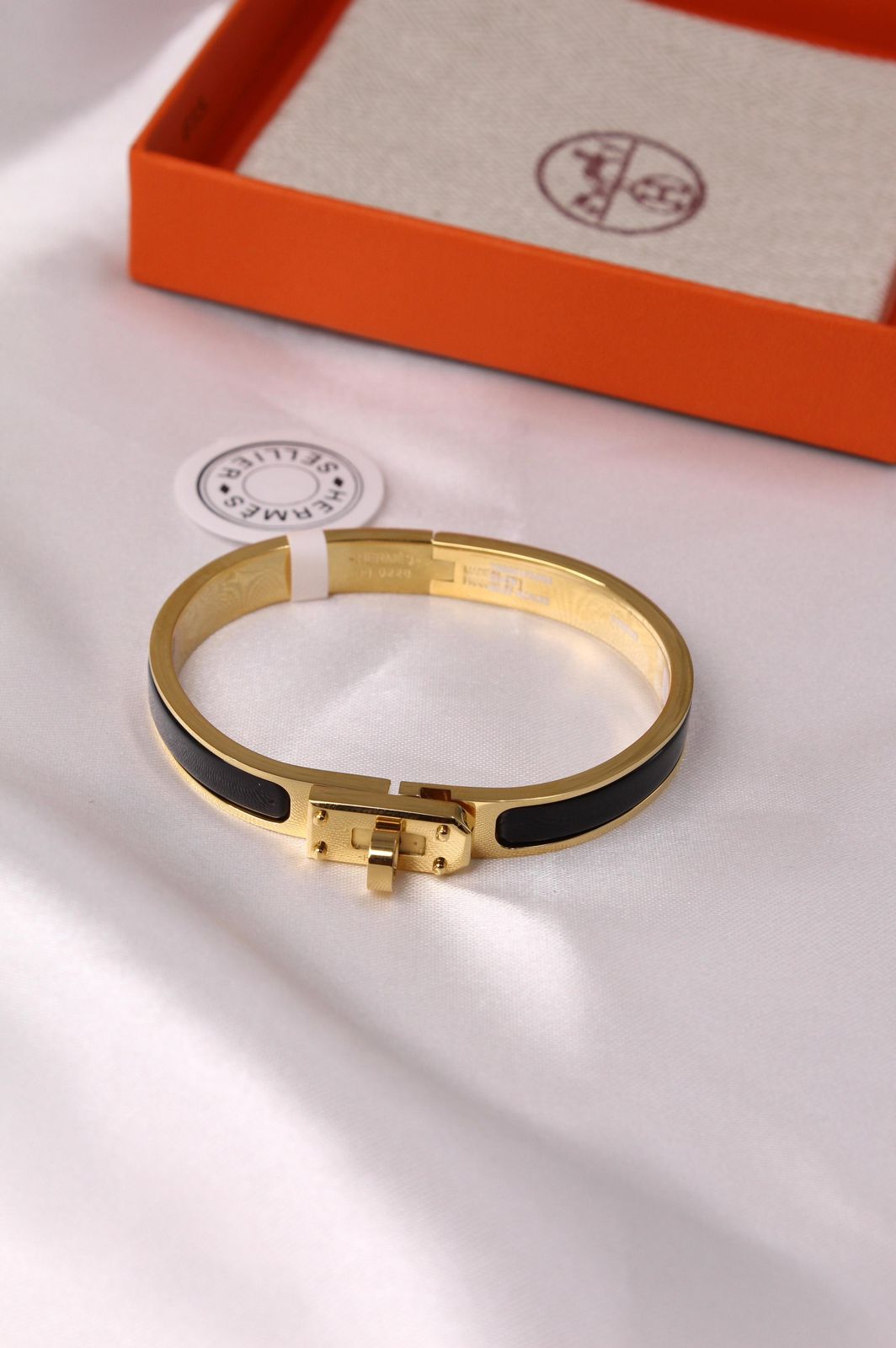 Hermès Kelly Enamel Bracelet (Gold and Black)
