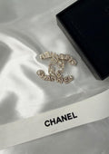 Chanel CC Ribbon & Crystal Brooch (Silver / Crystal)