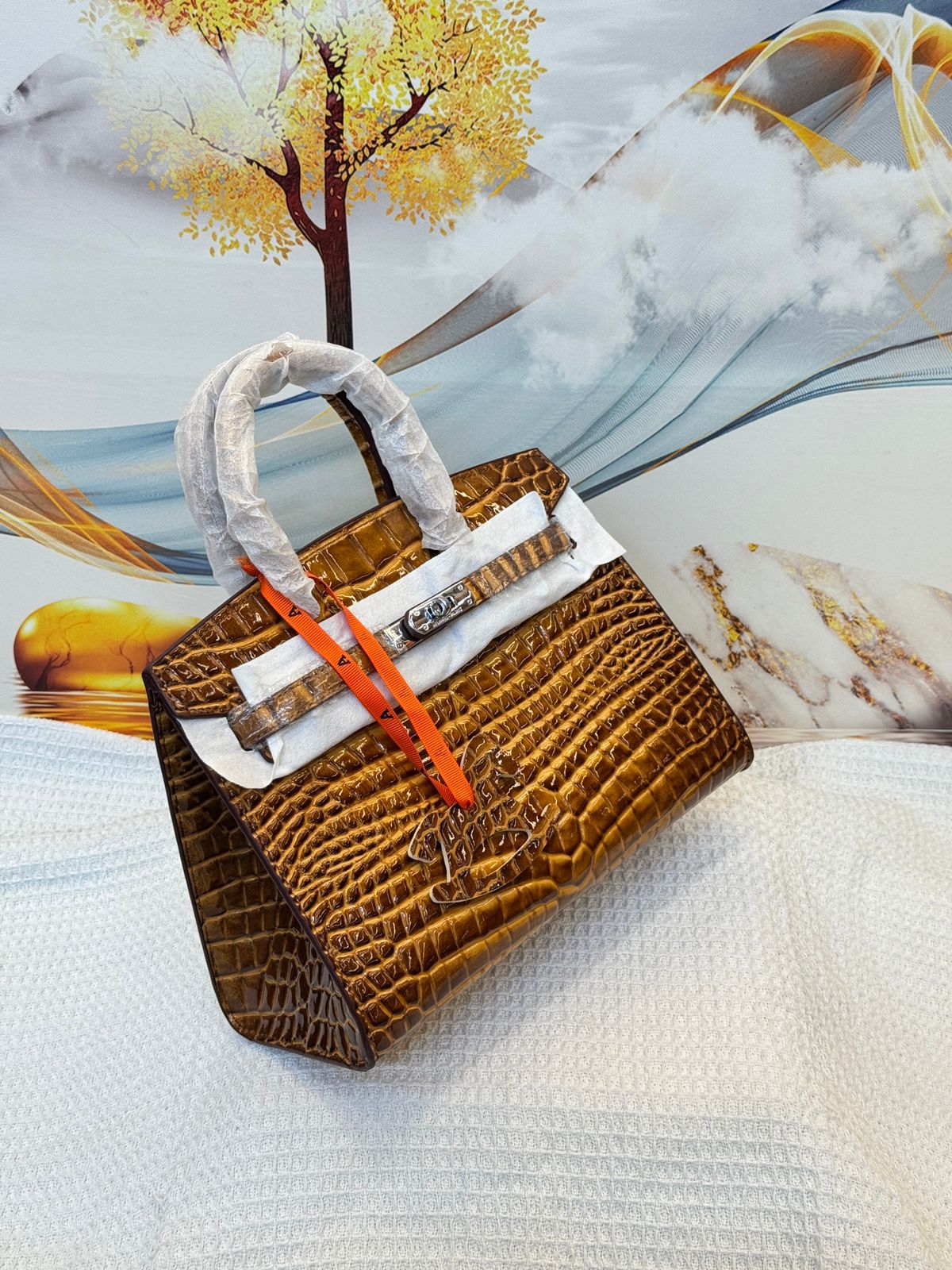 Hermès Birkin 25 (Miel / Honey Brown Shiny Porosus Crocodile / Alligator)